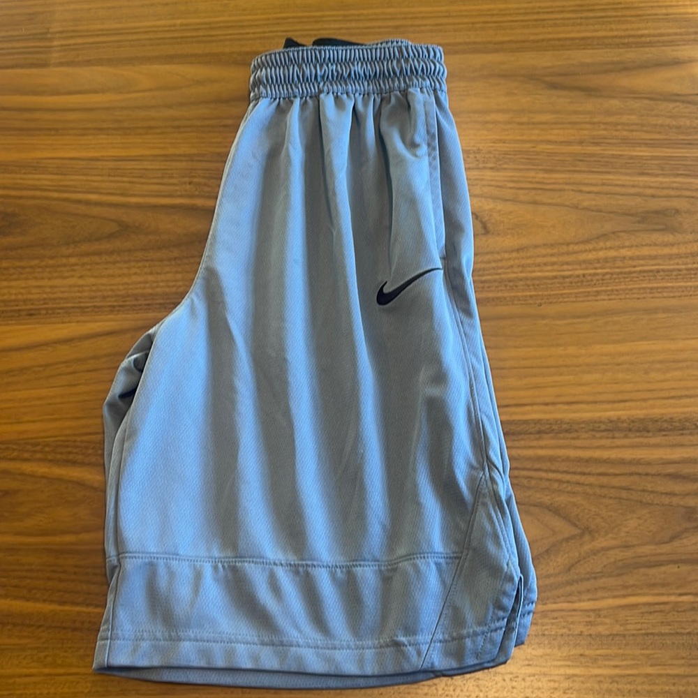 Nike Dri-Fit grey basketball shorts.